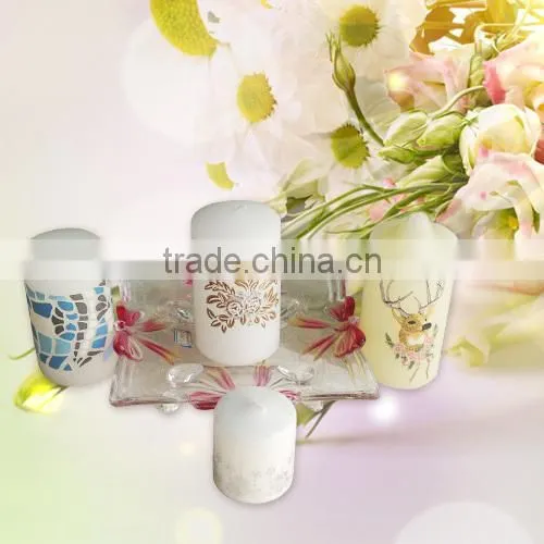 white applique pillar candle