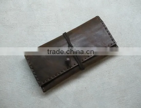 Newest generation leather tobacco pouch with cigarette rolling paper holder slot