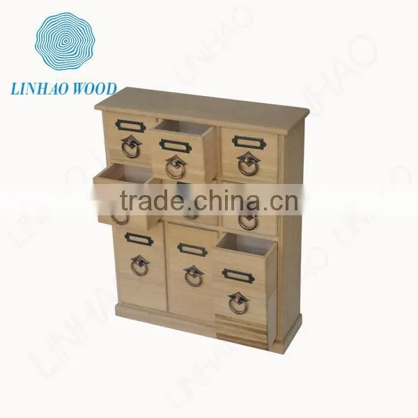 Wooden tea box with drawers