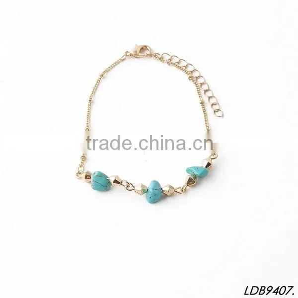 Antiquated cross with turquoise silver bangle cross bracelet