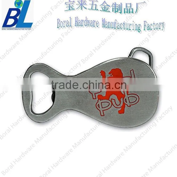Die casted reversible belt buckle with bottle opener