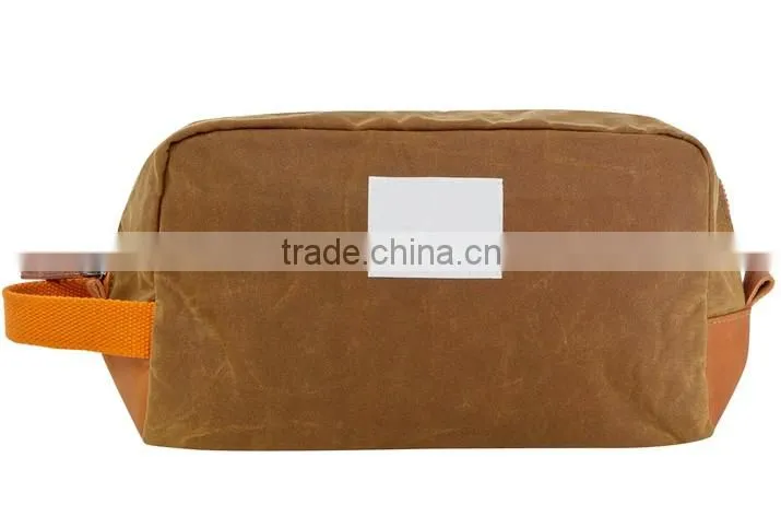 Custom khaki waxed canvas dopp kit with leather trim