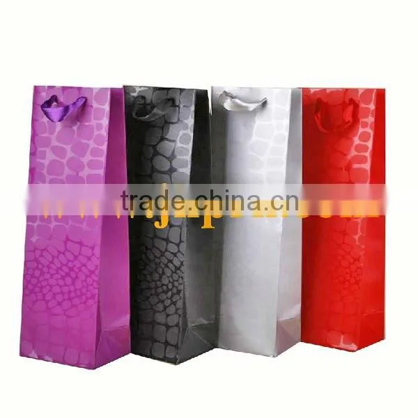 Red small gifts paper bags with hand tags