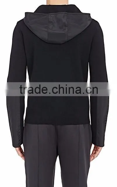 Black rib-knit virgin wool zip-front hoodie styled with tech-fabric elbow patches