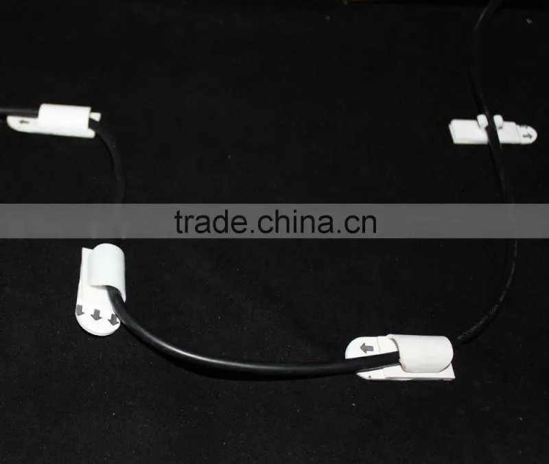 Plastic self adhesive cable wire grip