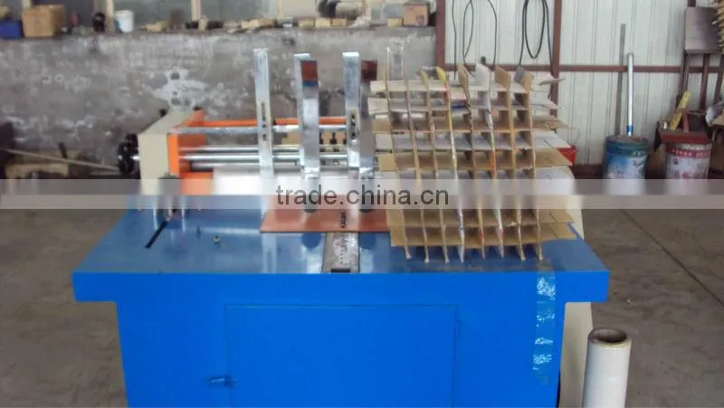 automatic partition slotting machine for corrugated cartons