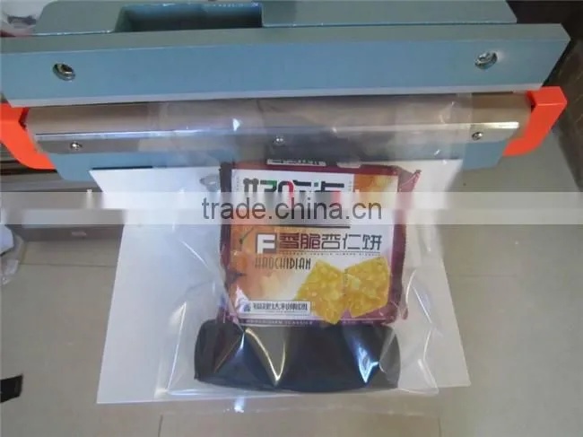 2017 Easy Operation Pedal Two Side Aluminum Foil Bags Sealing Machine