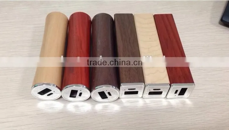 Wooden material cylindrical shape 2600mAh mobile powerbank charger with laser engraving logo as premium promotion gift