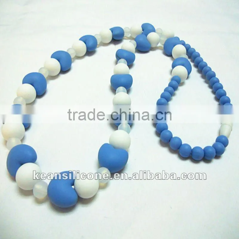 Salmon Orange Chew Silicone Teething Necklaces have a breakaway clasp Make by Food Grade Silicone