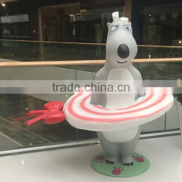 Fiberglass bear statue with lollipop