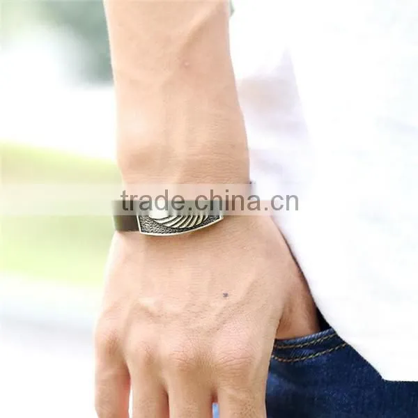 Fashion alloy cowhide leather bracelet,wing embossed leather charm bracelet