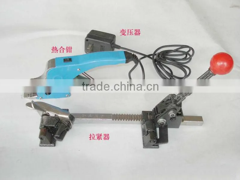 Handheld strapping machine