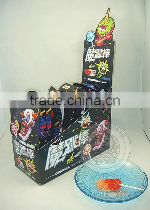 Hard candy lollipop with popping candy