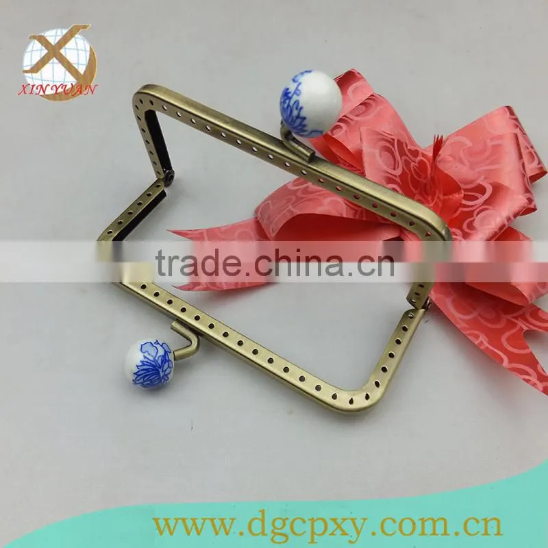ceramic head metal frame for purse