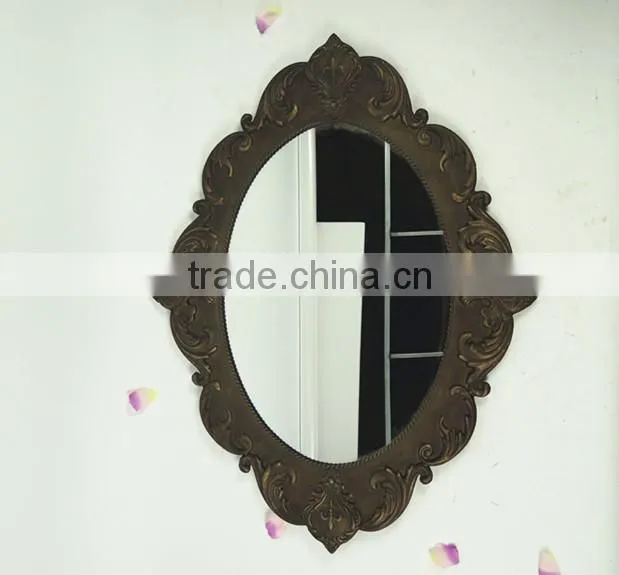 Shabby chic metal antique wall mirror in oval shape