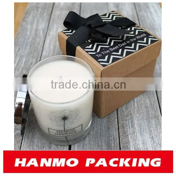 factory work candle packaging boxes