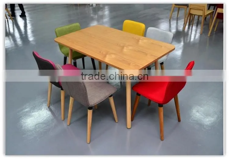 black fabric wooden dining chairs