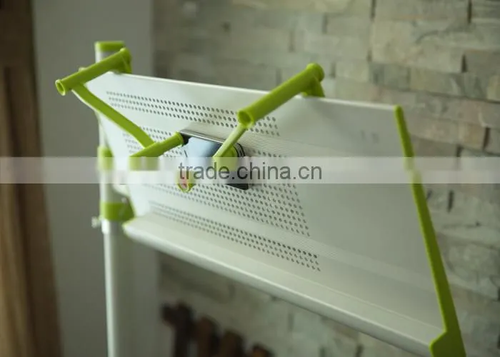 Portable folding notebook desk stand with mouse pad in bed
