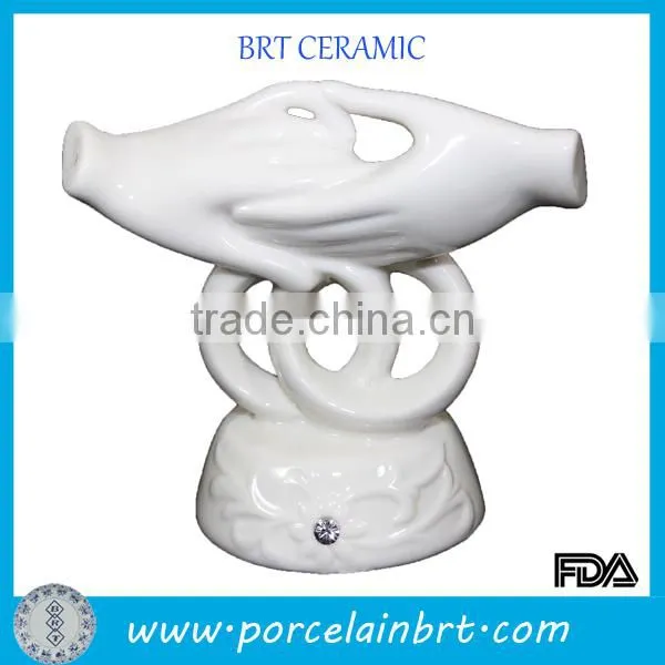 Holding hands white ceramic wedding centerpieces