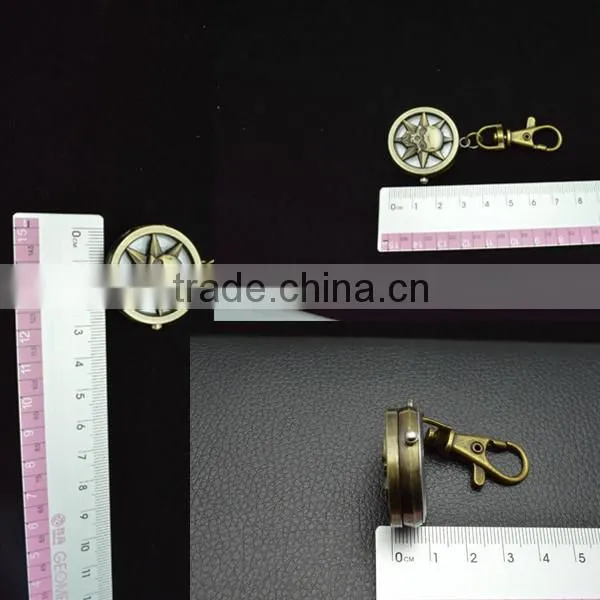 Sun god pocked watch with key chain