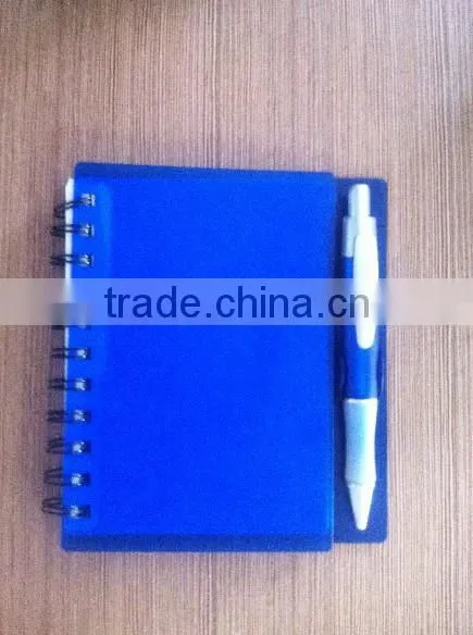 Red color pp sprial notebook with pen