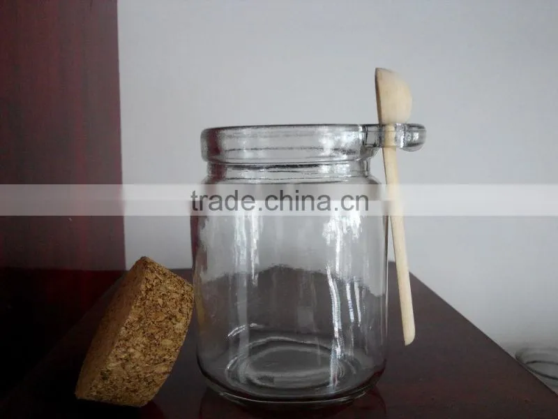 Glass spice jar with spoon and cork lid