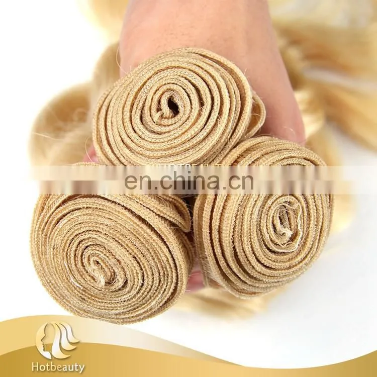 Hot sale natural blonde curly hair extensions, human hair body wave.
