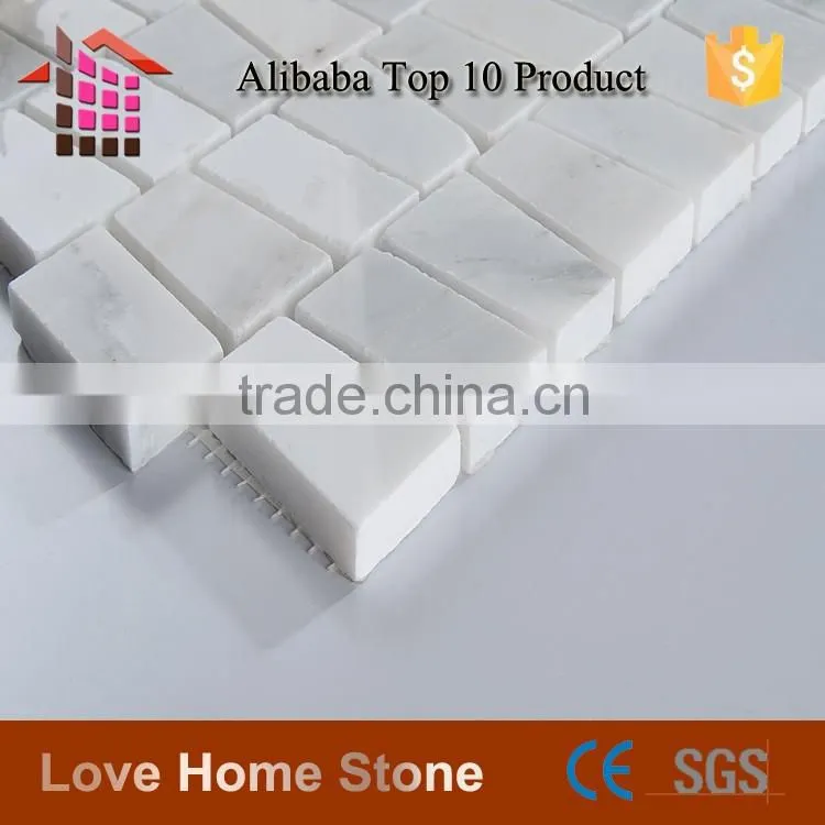 Carrara white mosaic tile, trapezoid tile backsplash