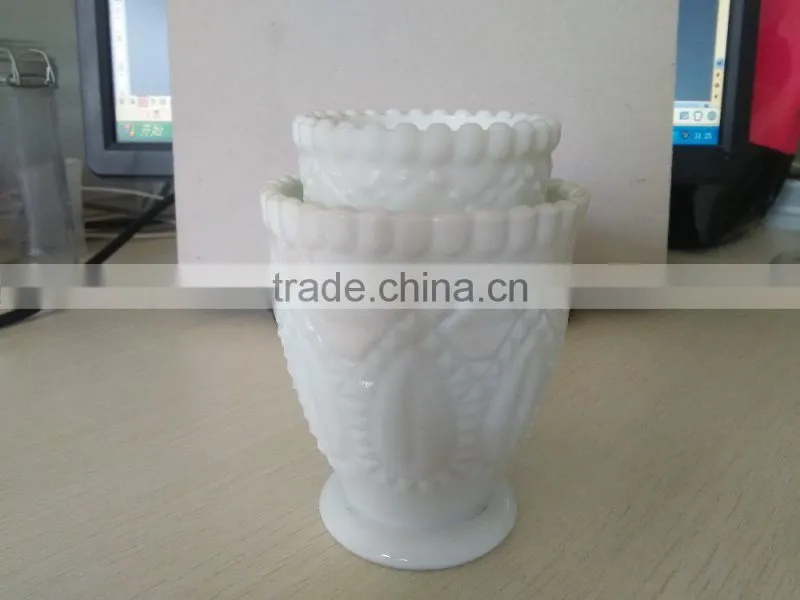 white cup shape candle jar