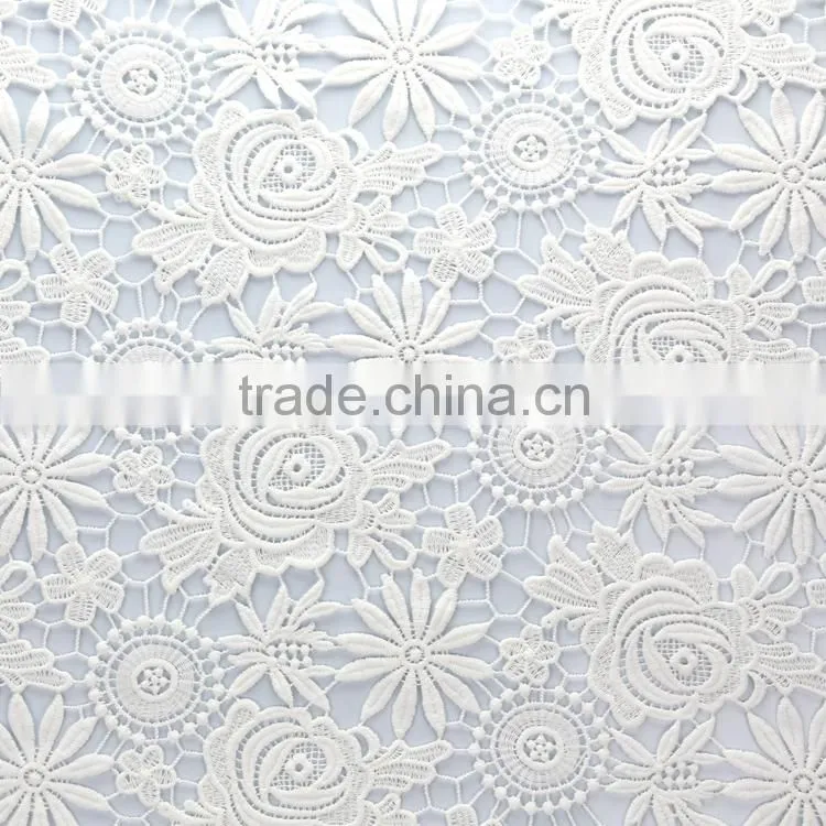 OEM/ODM Manufactur simple and elegant embroidered fabric with cutwork embroidery for wedding dress