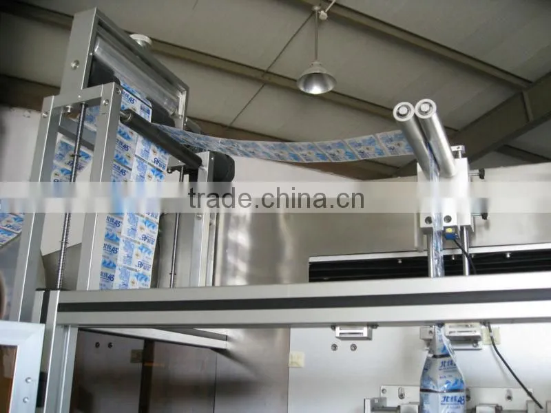 AUTOMATIC SLEEVE LABELLING MACHINE