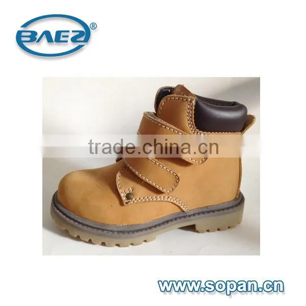 Children boot with work boot looking strong and safe