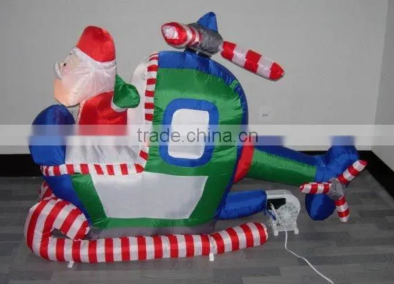 Inflatable santa claus sitting on aircraft for sale