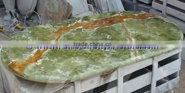 A GRADE DARK GREEN ONYX TABLE TOPS COLLECTION