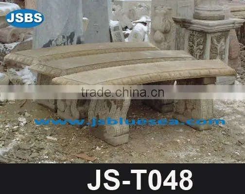 Stone carving of table and bench