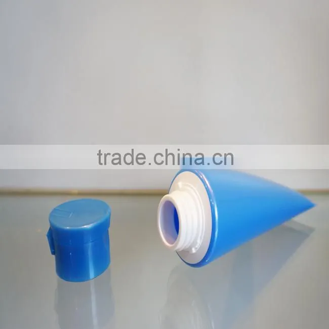 plastic tube with oriented flip-top cap