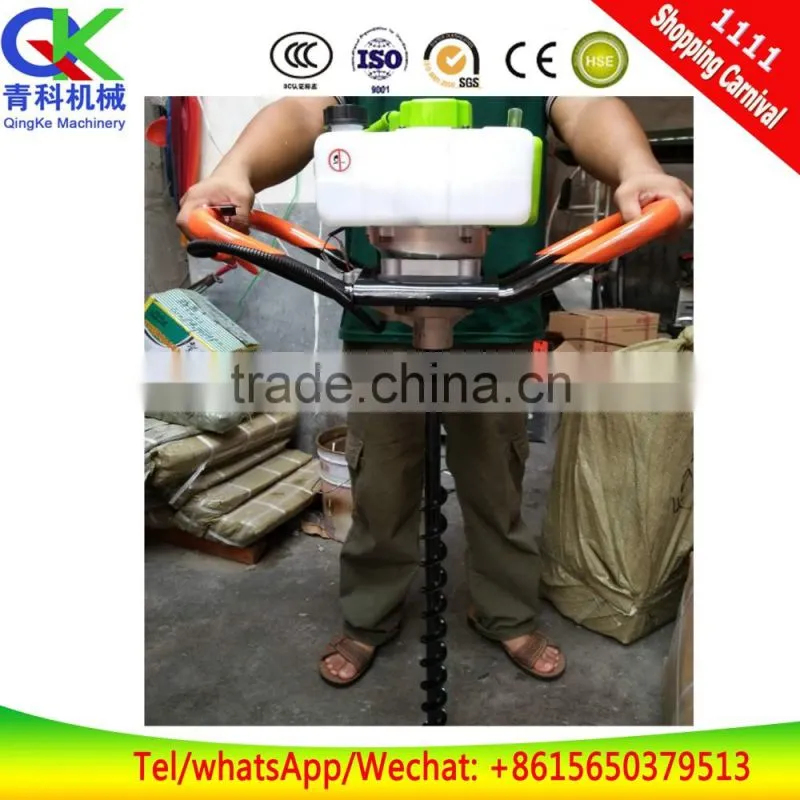 Orchard earth auger with Honda petrol engine