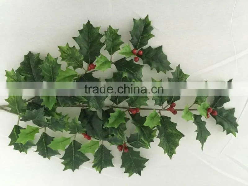 Artificial holly plant branch with red berries