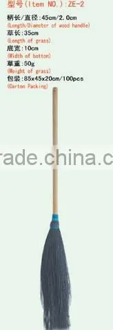 festive wood handle grass broom