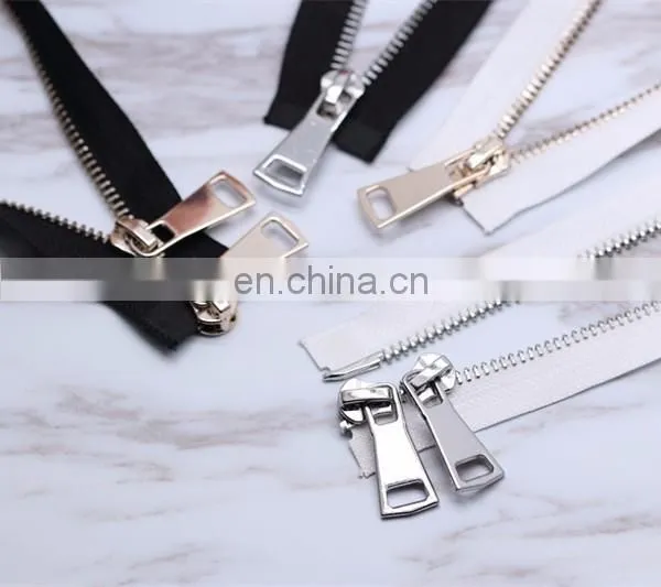 black and white double -ended light gold and white gold silver metal zipper