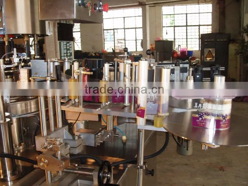 rotary adhesive labeling machine