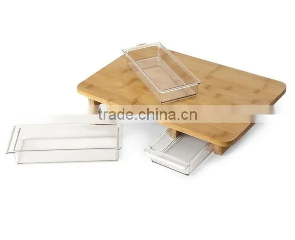Bamboo cutting board with storage drawers