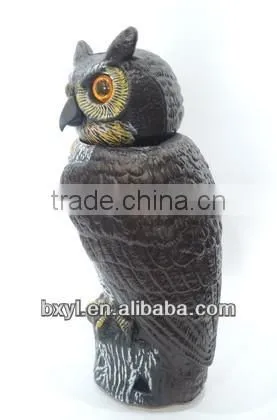 cute smart garden owl with plastic bobbling head activated moving by wind action