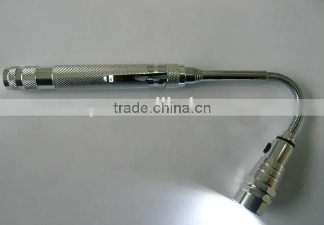 LED flashlight with telescopic magnetic pick-up tool