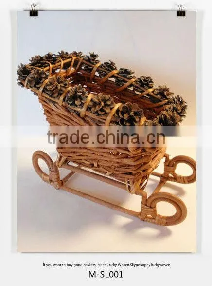 Chirstmas craft & wicker sled & wicker sleigh with pine cone decorate