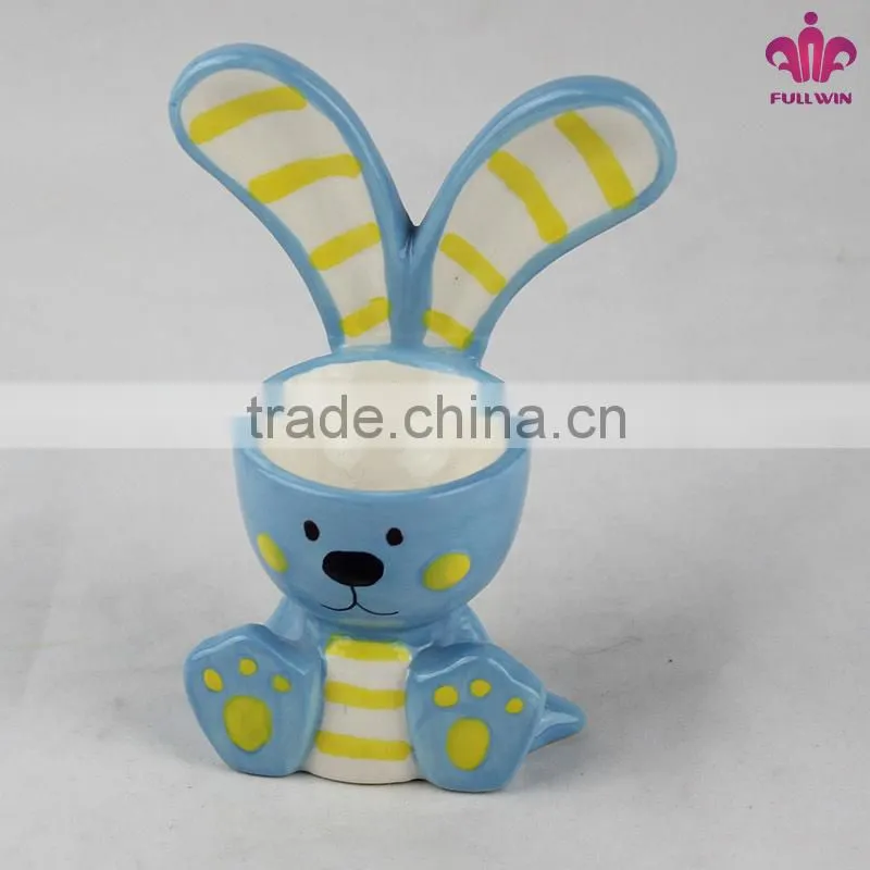 Ceramic egg holder with rabbit design