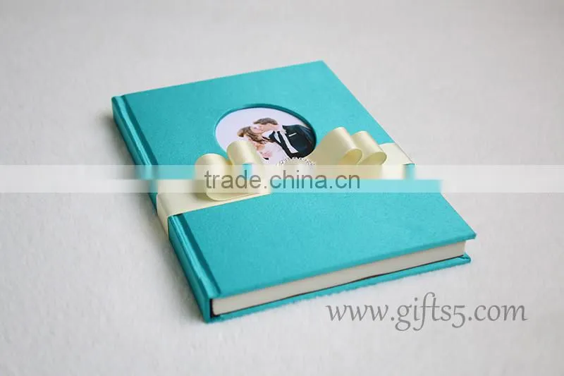Unique wedding guest book with ribbon bow