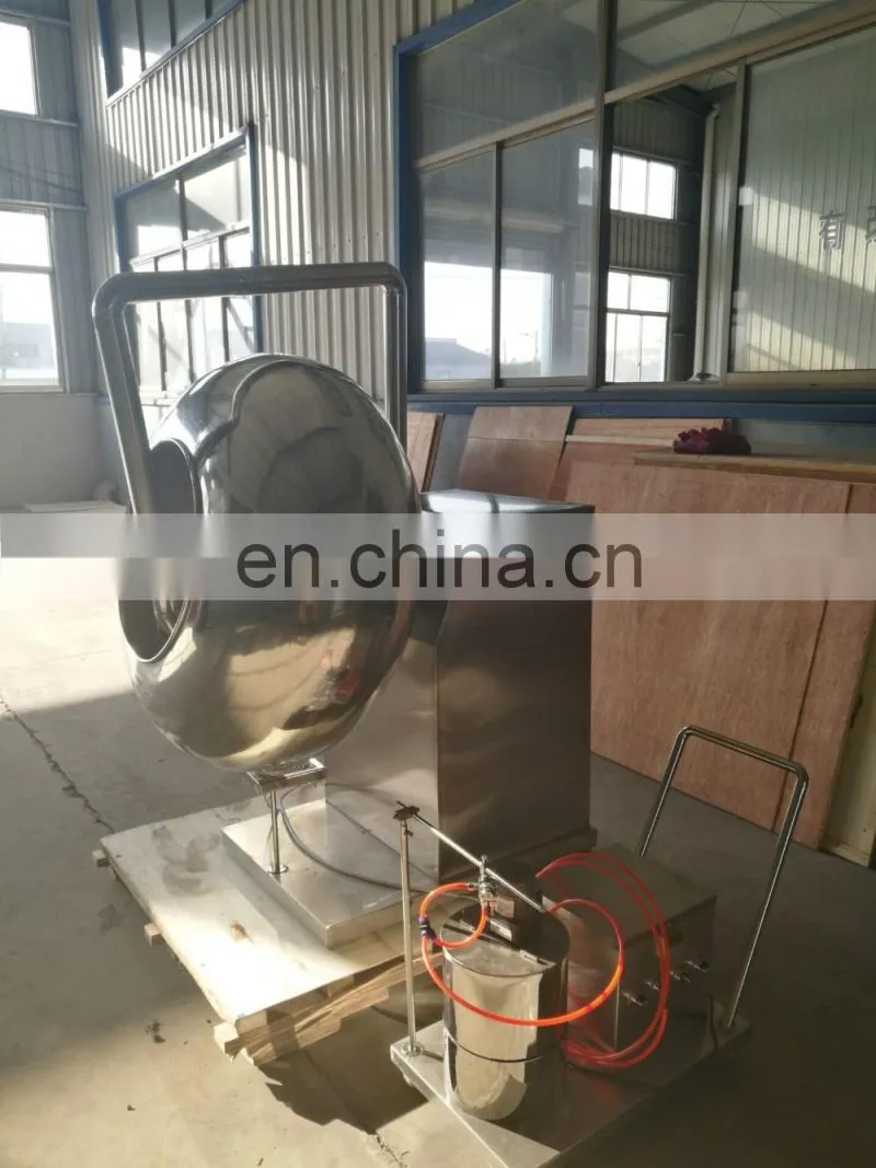 Automatic chocolate candy coating machine with spray system