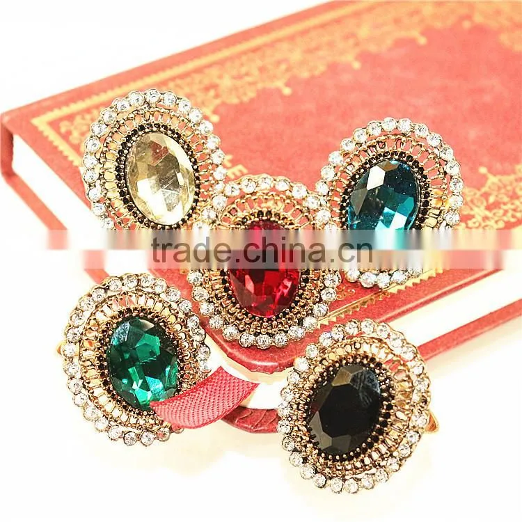 Big gold ring with big oval stone shape finger ring