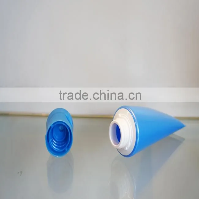 plastic tube with oriented flip-top cap